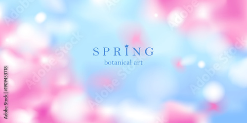 Spring blurred landscape with cherry blossoms, flying petals. Blue sky, white clouds. Unfocused, bokeh nature background. 