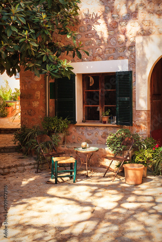 Picturesque view of a cozy courtyard in a small town in Mallorca, Spain