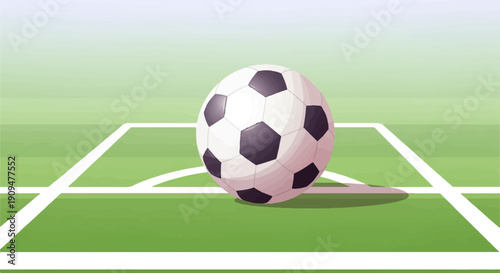 A soccer ball rests on a green field with white lines marking the boundary