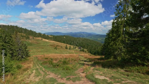 A view of the Rycerzowa meadows. A panorama of the Żywiec Beskids. The mountain shelter on Rycerzowa. Summer in the mountains. Poland. Mountain tourism.