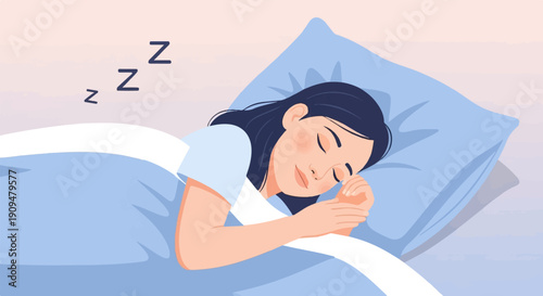 A woman peacefully sleeps on a pillow under a blue blanket