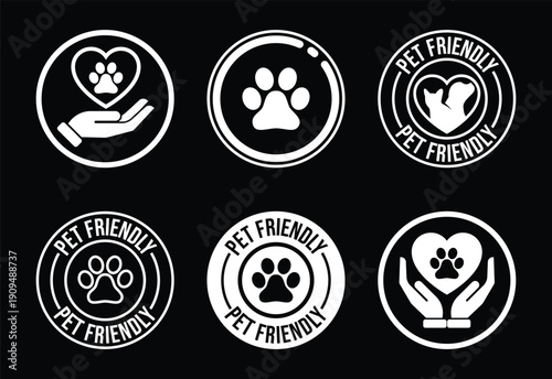 Set of pet friendly icons with paw prints and hearts white on black