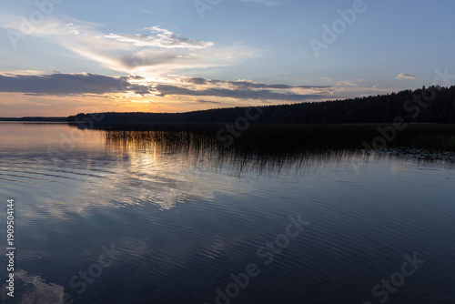 Wallpaper Mural A tranquil lake at sunset reflects the colorful sky Torontodigital.ca