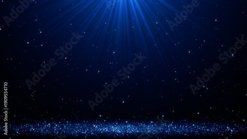 Fotografie blue light rays with sparkling particles on a dark background, luxury glitter ab