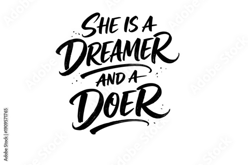 Expressive black ink script saying "She is a dreamer and a doer"