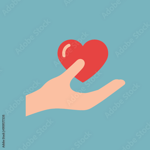 A human hand gently holding a vibrant red heart, symbolizing love, care, and compassion on a teal background.