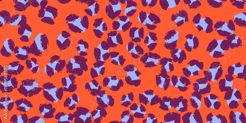 Abstract leopard print vector pattern in vivid orange with contrasting lavender and deep plum spots
