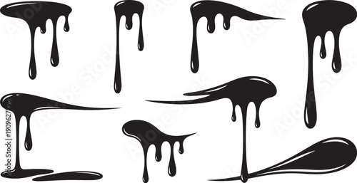 Black paint drips on white background in various shapes