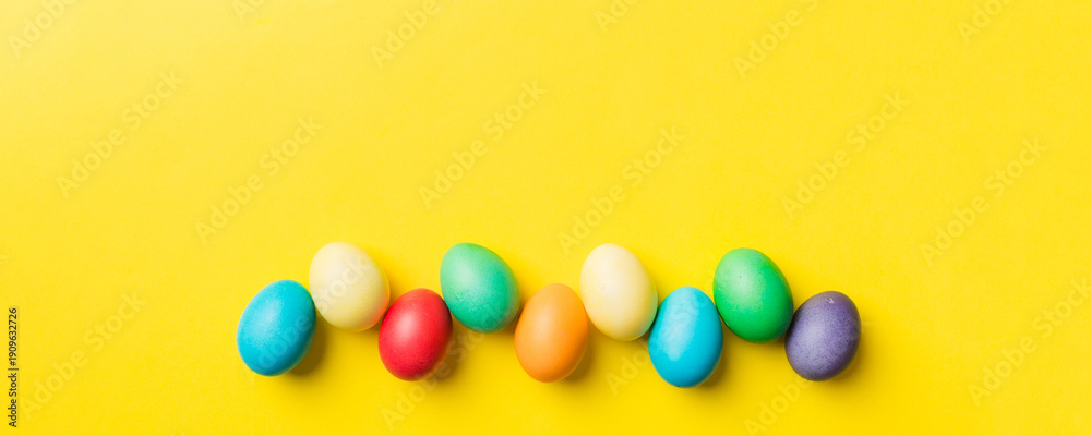 Obraz premium holiday preparation Multi colors Easter eggs on colored background . Pastel color Easter eggs. holiday concept with copy space