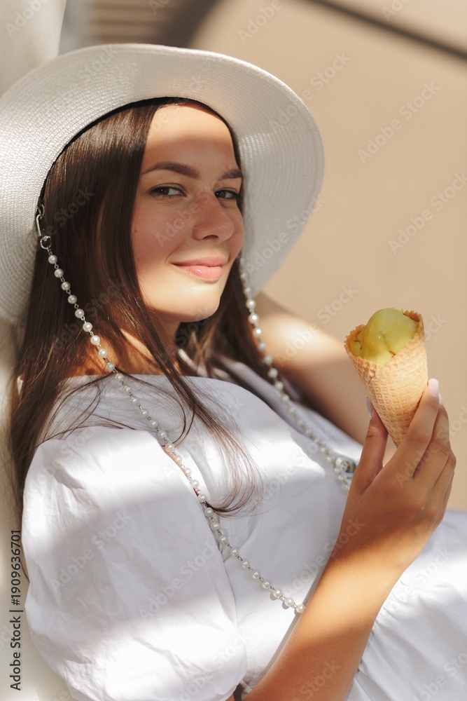 custom made wallpaper toronto digitalYoung caucasian woman eating ice-cream during summer sunny day. Brunette wears white dress and hat