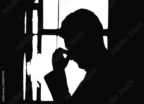 silhouette of a depressed man