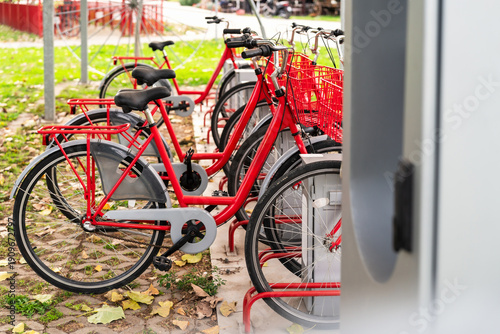 Canvas Print Urban bike share station with docking bikes