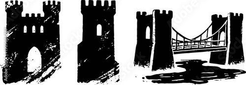 medieval castle towers and arched bridge in silhouette with water reflection