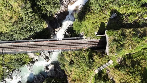 Railway Bridge Through Scenic Mountain Tunnel Over River