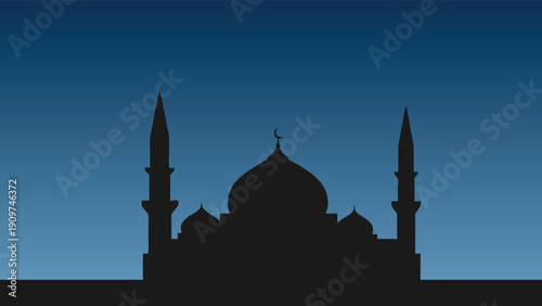 Silhouette of a mosque with minarets and dome against blue sky
