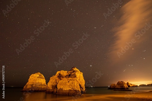 Schilderij op canvas lights on the sea Algarve