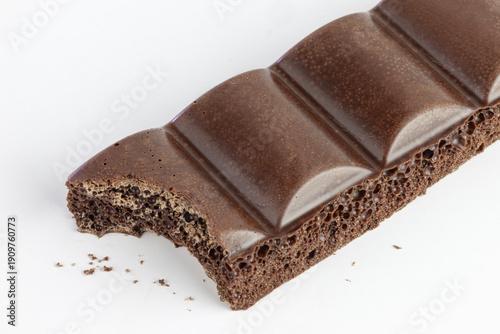 Close up of a bitten milk aero chocolate bar