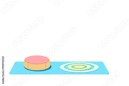 Round shapes sit on a blue mat with a pattern in a simple setting during daylight hours for a playful activity