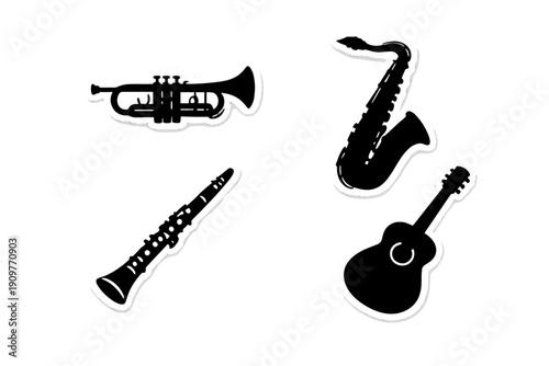 A collection of four black and white musical instrument stickers including a trumpet, saxophone, clarinet, and acoustic guitar, featuring white outlines on a dark background.
