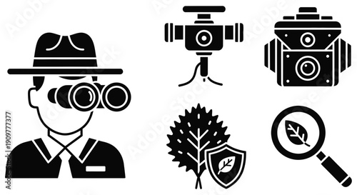 Outdoor explorer wearing a wide brim hat using binoculars for detailed observation of wildlife and natural environments during focused field research activities