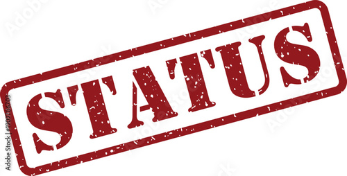 The word STATUS is prominently displayed within a red textured rubber stamp on a clean white surface