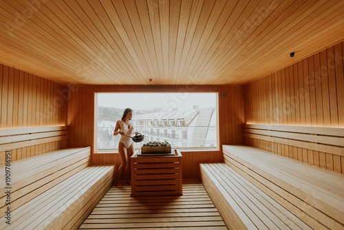 Woman enjoys sauna experien...