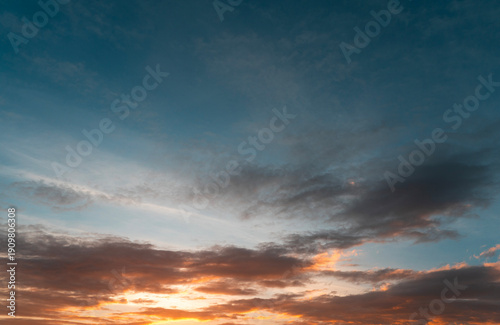 Beautiful colorful sunset with orange clouds. Sky background.