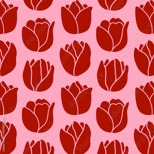 Seamless pattern of red floral buds on a pink background for fabric and wallpaper design.