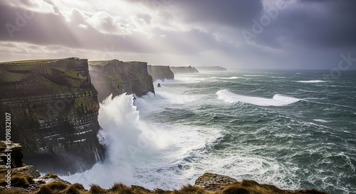 Dramatic Cliffs of moher coastline landscape featuring massive ocean waves crashing violently against the rugged irish sea cliffs under a stormy sky