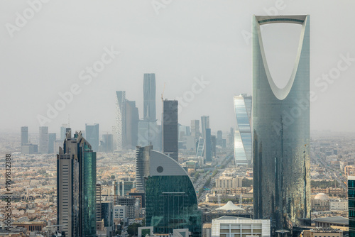 Contemporary cityscape with futuristic high rise architecture, corporate towers and dense urban downtown development representing economic growth, Al Olaya, Riyadh, Saudi Arabia