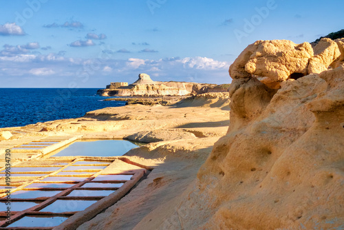 Photos Natural and cultural landscape near Zebbug on Gozo, Malta, with salt pans, sea and striking rock formation