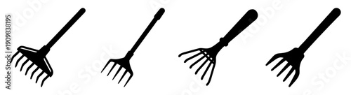 Set of four black garden rake tools isolated on white background for spring cleaning and yard work