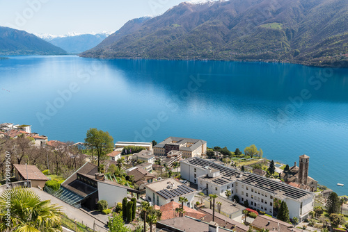 Scenic landscape of Lake Maggiore featuring the village of Brissago along the coastline in Canton Ticino, Switzerland.