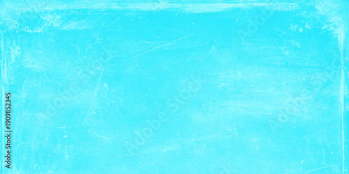 Cyan blue textured background with distressed vintage border and grunge scratches, abstract paper or wall backdrop
