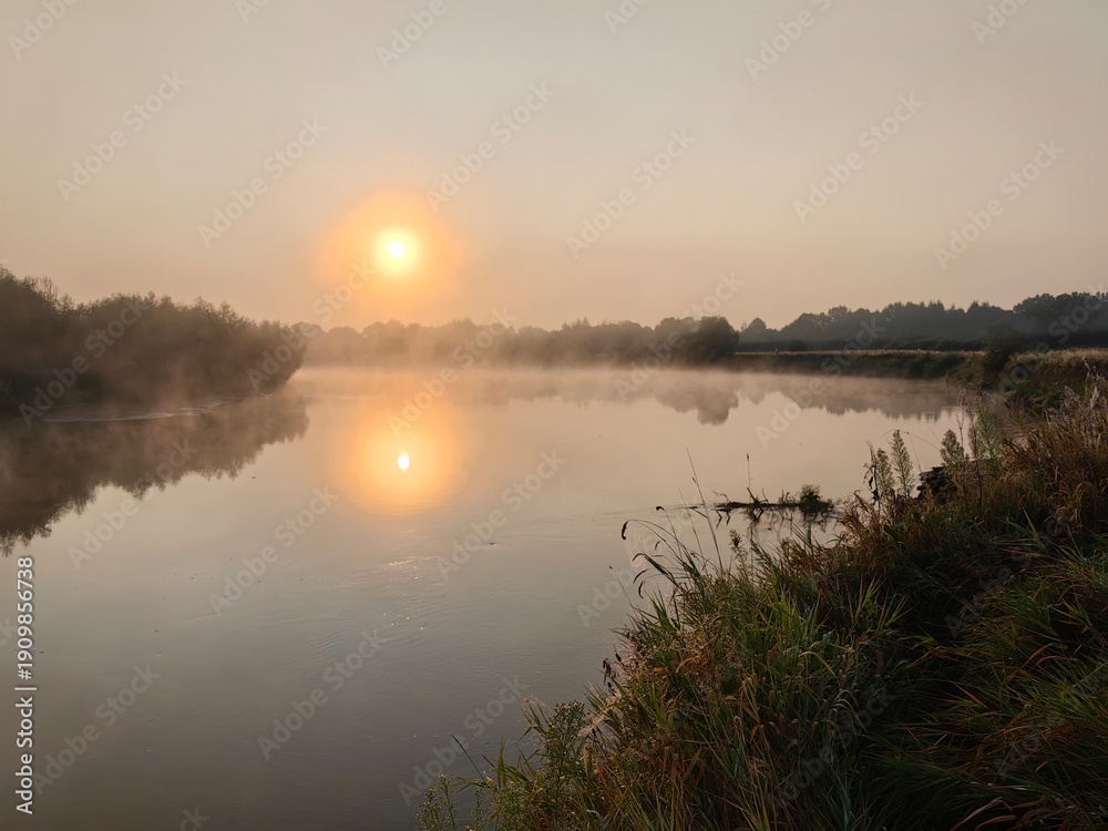 Fototapeta premium Fog over the Dnieper River, autumn landscape with sunrise.