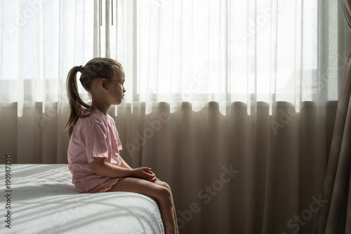 Εκτύπωση καμβά Sad Child Sitting Alone by Window – Mental Health, Anxiety and Loneliness in Chi