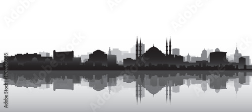 Black and white panoramic poster of the city skyline with misty background buildings and water reflection of ISTANBUL, TURKEY