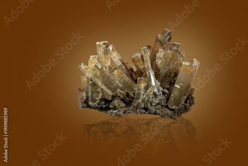 Foto Crystals on a druse with a dark orange background.