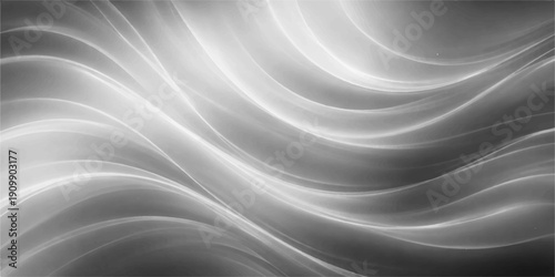 An abstract black and white background featuring smooth silk waves and an elegant flowing texture with soft grey curves in a seamless satin fabric design