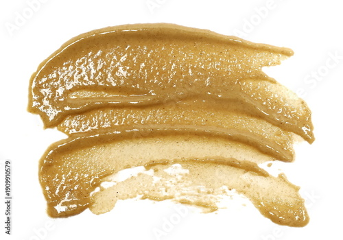 Fotografie Sesame butter, paste tahini spread isolated on white background, top view