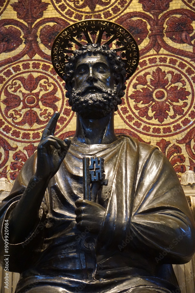Fototapeta premium Frontal vertical close up portrait of the iconic bronze statue of Saint Peter inside St. Peter's Basilica in the Vatican, Rome, Italy