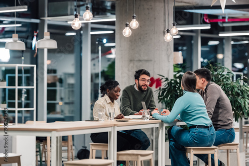 Φωτογραφία Diverse startup team collaborating brainstorming ideas in modern office