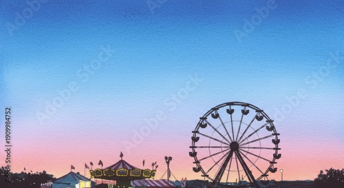 Amusement park with ferris wheel and carousel against sunset sky