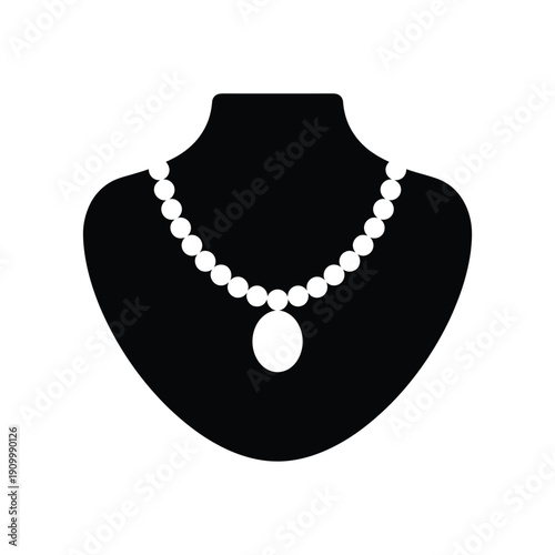 Elegant pearl necklace displayed on a black jewelry bust silhouette