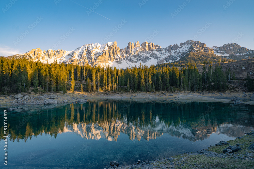 Fototapeta premium Sunset view of Lago Carezza during spring time, Dolomites, Italy.