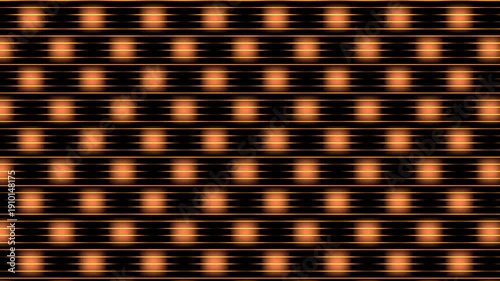 Orange dots on black background forming a grid pattern.