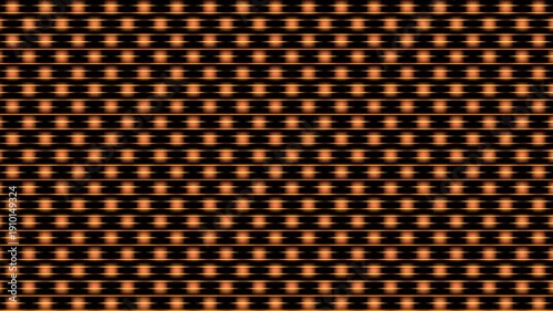 Orange dots on black background forming a pattern.