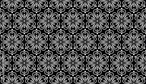 Flower geometric pattern. Seamless vector background. White and black ornament.