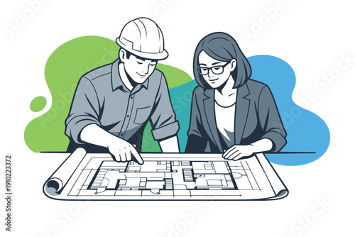 Architects reviewing building plans together at a table.