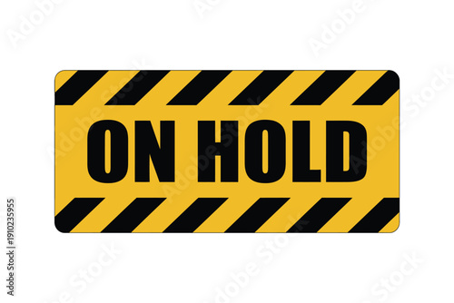 A yellow and black sign indicating a temporary pause